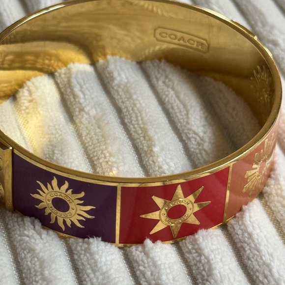 533. Coach Limited Tony Duquette Sunburst Gold Bangle. Measures 7.5”. - Picture 3 of 5